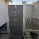 Make the pool area with Jordanian basalt stone with Turkish tundra marble